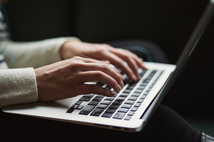 Digital writing tools like Grammarly and Hemingway App complement human editing skills by identifying technical errors and readability issues that writers might overlook during revision.